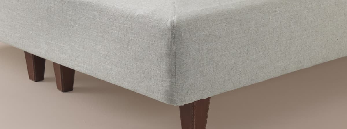 The bed cover Base cover on a DUX bed with tapered legs