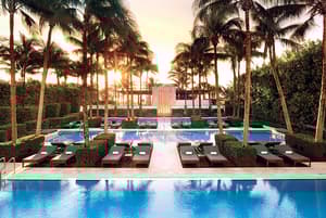 Poolside, palm trees and sunset at The Setai in Miami